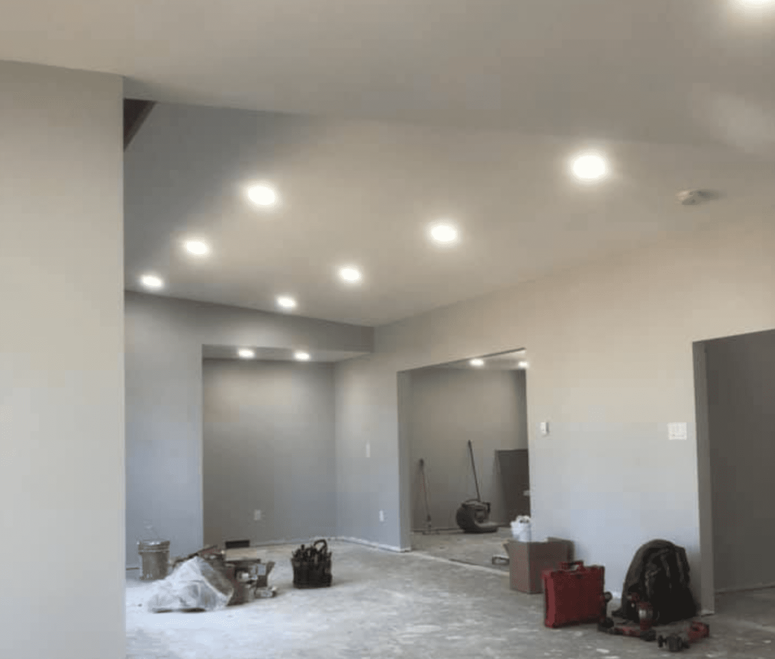 Person Using Dewalt Cordless Impact Driver on Brown Board<br />
